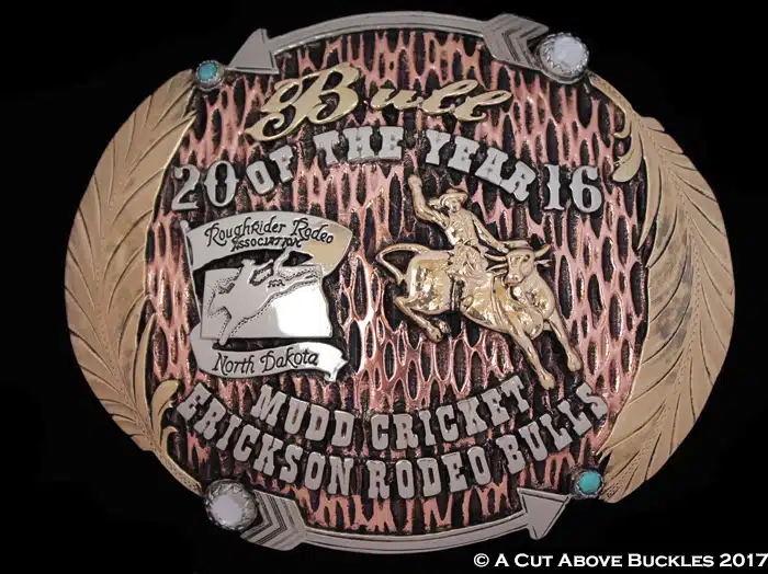 #00084: Hammered and Antiqued Background on a copper base with feathers and arrows on border, 3 Tone Trophy Buckle